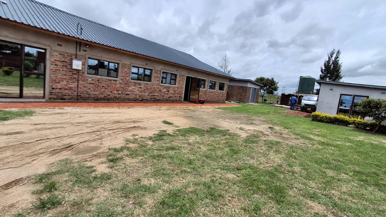 Brick classroom block and school grounds